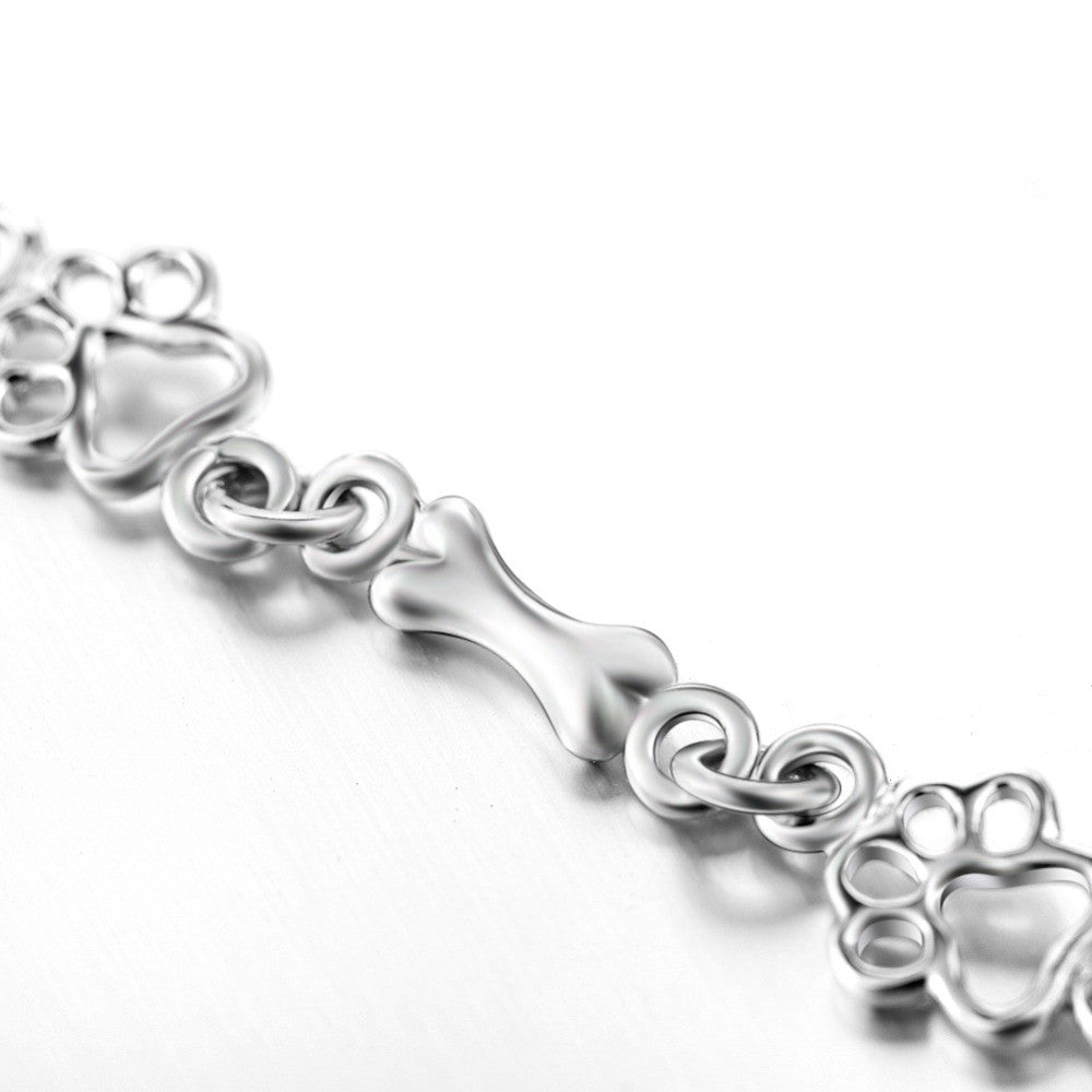 Aurembiaix™ | Armband mit Pfotenabdruck und Knochen-Charm in Silber