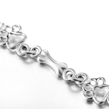 Aurembiaix™ | Armband mit Pfotenabdruck und Knochen-Charm in Silber