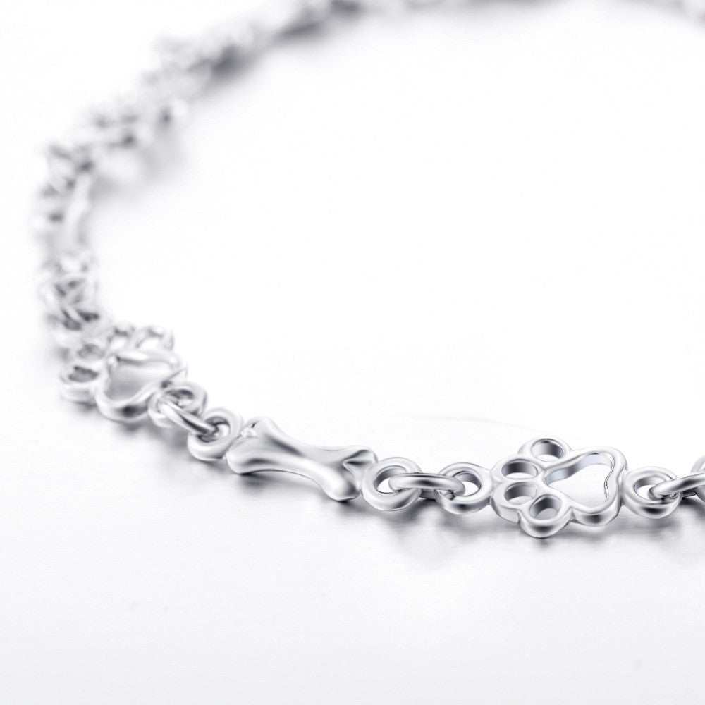 Aurembiaix™ | Armband mit Pfotenabdruck und Knochen-Charm in Silber