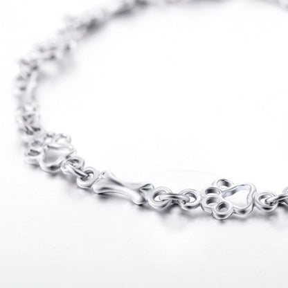 Aurembiaix™ | Armband mit Pfotenabdruck und Knochen-Charm in Silber