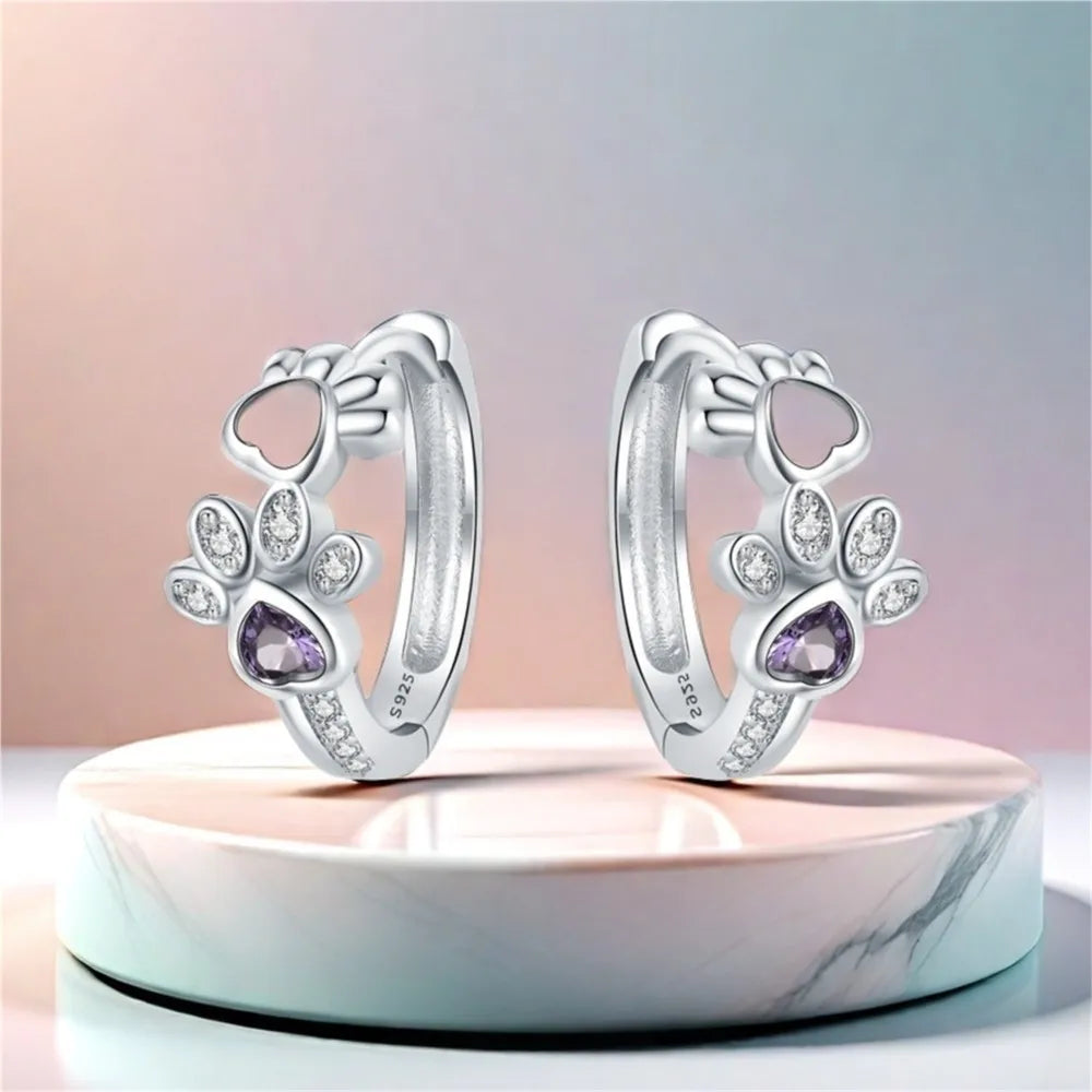 Elixane™ | Silver Paw-Print Huggie Earrings
